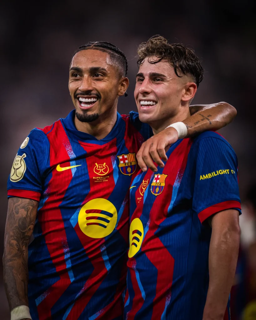 BARCELONA CLUB FAN PAGE. Barcelona players raphinha and fermin lopez standing together